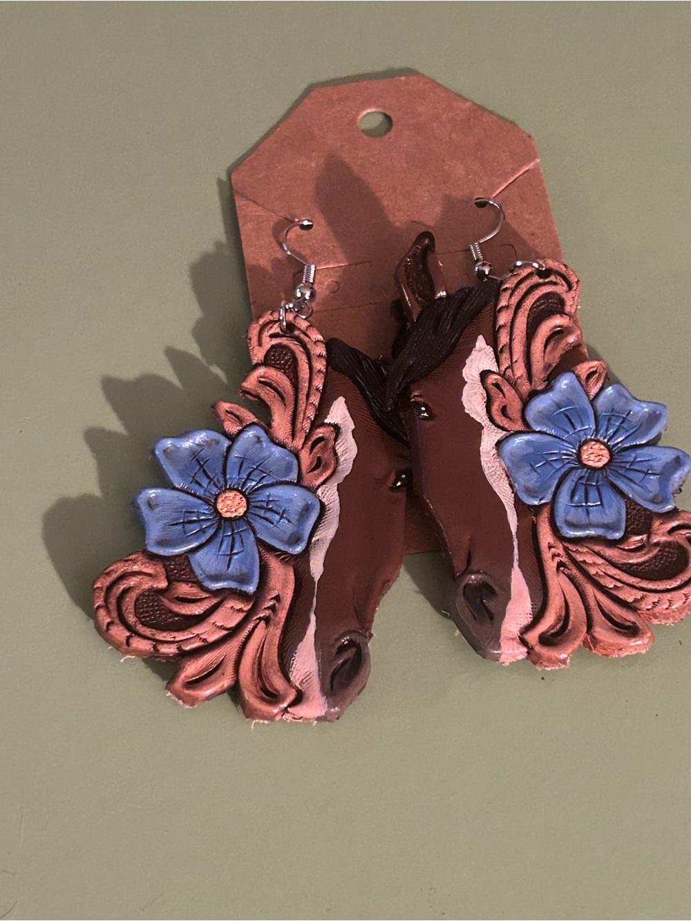Handcrafted Horse Head Earrings with Blue Flower